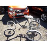 A 1970s adult's 3-speed tricycle with shopping basket