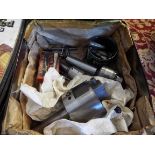 A box containing a selection of engineering lathe tools