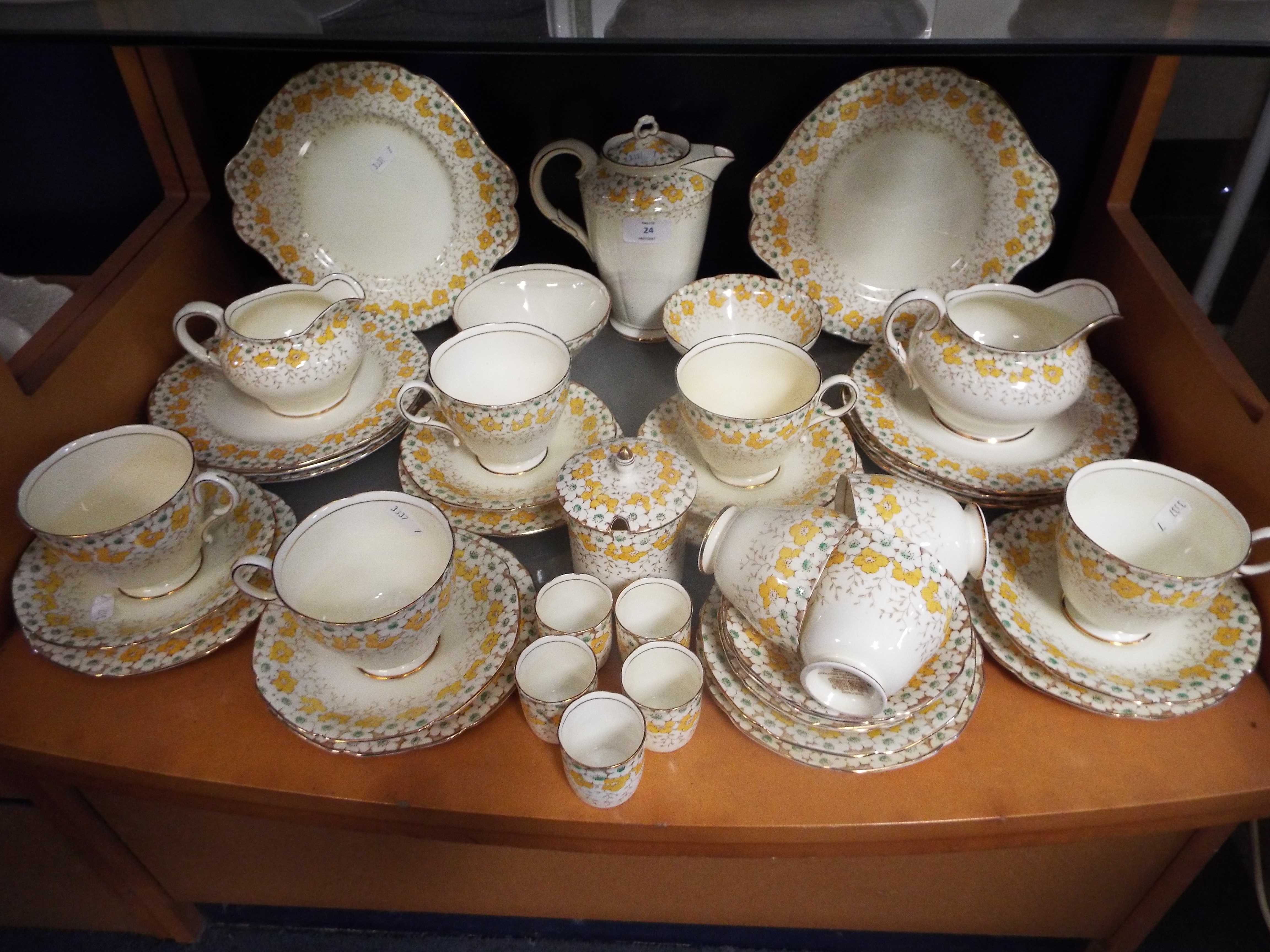 A Paragon 'May Blossom' Art Deco tea set comprising cake plates, tea pot, sugar bowls,