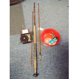 A vintage Carter & Co London split cane sea fishing rod together with a boxed Allcocks aerialite 3