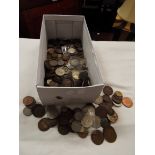 A quantity of Victorian and later coins of the world to include crowns, sixpences,