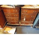 A pair of Georgian style mahogany bow fronted four drawer chests