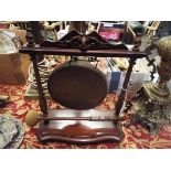 An Edwardian gilt brass and mahogany dinner gong stamped 'Shall' to base