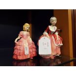 Two Royal Doulton figures;