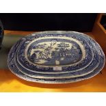 A large Davenport 'Willow Pattern' meat plate together with two smaller