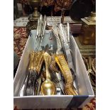 A quantity of vintage gold and silver plated cutlery