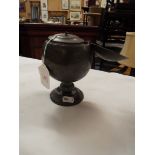 An Oriental pewter caddy in the form of a globe