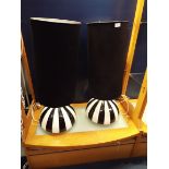 A pair of Italian black and white segmented ceramic table lamps and shades