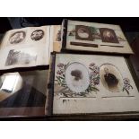 An album containing Victorian and later photographs together with a scrap album containing mainly