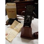 An extremely good Rolleiflex T Grey with twin lens and leather case complete in original box with