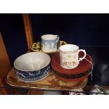 An Aynsley 1911 coronation mug and Italian slipware bowl, a red lacquered bowl,