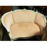 A 19thC French painted love seat with rope twist and floral carved frame and acanthus hand rests