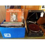 A mixed selection of vintage records and a gramophone