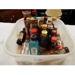 A selection of alcohol miniatures to include Bombay Sapphire, Courvoisier,