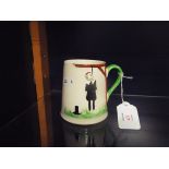 A 1930s Carlton ware 'Hangman' tankard with embossed hanging pilgrim to front and verse to back and