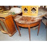 A Victorian ebony and boxwood strung crossbanded mahogany demi lune side table with floral inlay,