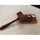 A mid-20thC mahogany gavel and oak block