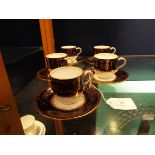 Five early 20thC Wedgwood coffee cans and saucers,