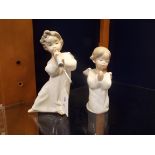 Two Lladro figurines of angels,