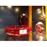 A Czechoslovakian Bohemian ruby glass paperweight together with a Whitefriars ruby glass dish and a