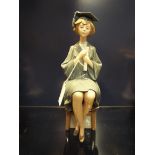 A Lladro figure 'Graduation Girl',