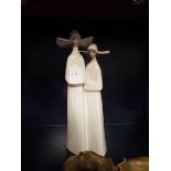 A Lladro figural group of two nuns, no.