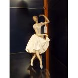 A Lladro figurine of a 'Weary' ballerina,