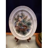 A David Sharp plaque having hand-painted bird and foliate decoration,