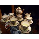 A K & K china 'Roseberry Studios' tea set with transfer print fruit design