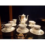 A mid-20thC Royal Staffordshire bone china floral and gilt coffee set for six