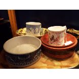 An Aynsley 1911 coronation mug and Italian slipware bowl, a red lacquered bowl,