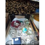 A box of assorted glassware to include animal figures, jelly moulds, paperweight,