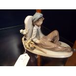 A Lladro figurine 'Time To Rest', with hobo bindle,