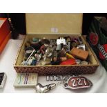 Miscellaneous items to include vintage car badges, napkin rings,