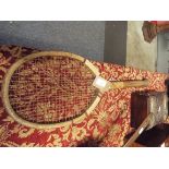 An early tennis racket having fish tail handle