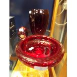 A Czechoslovakian Bohemian ruby glass paperweight together with a Whitefriars ruby glass dish and a