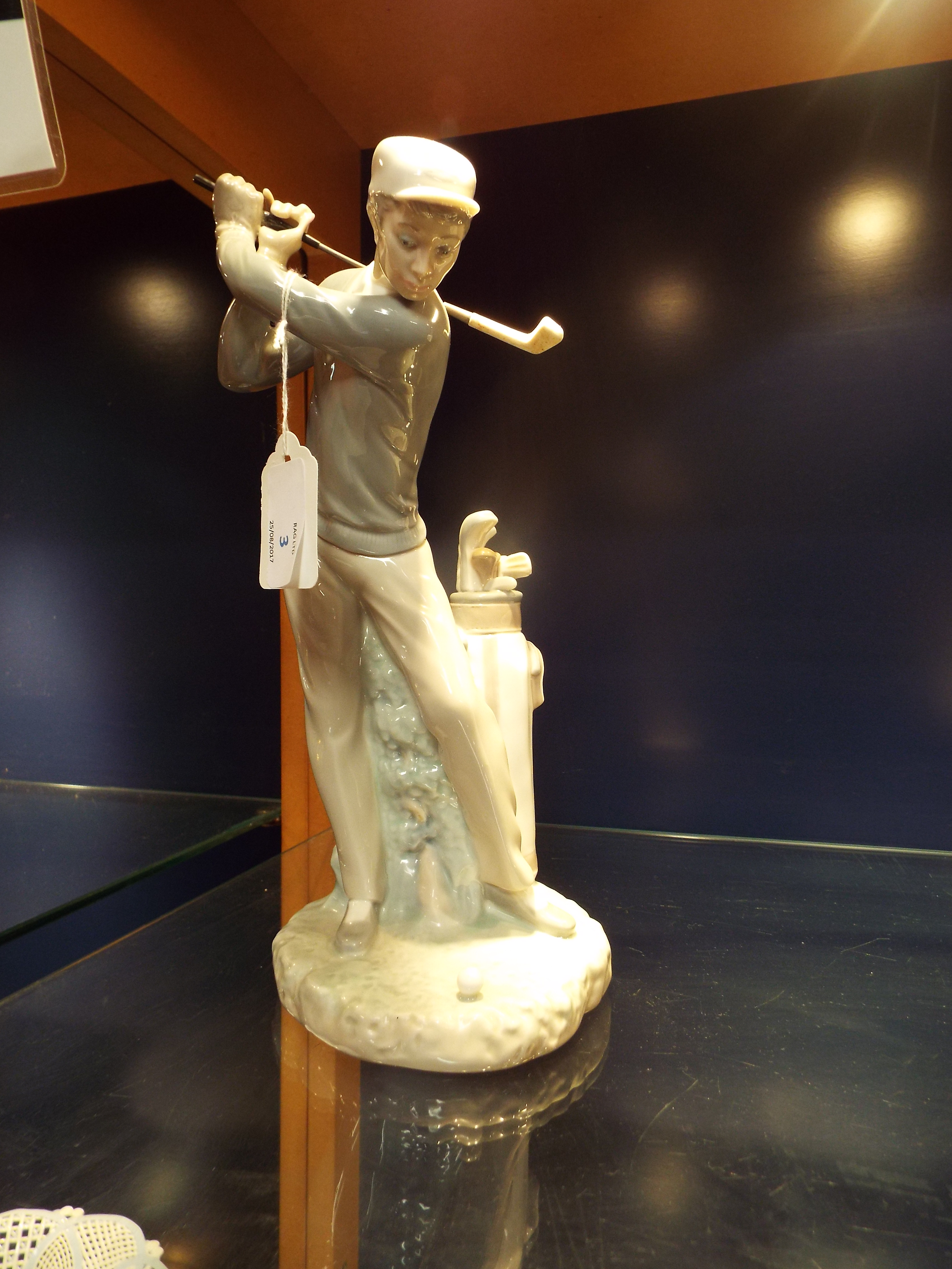 A Lladro figure of a 'Golfer',