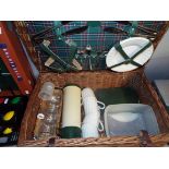 An Optima wicker picnic hamper complete with fitted interior and contents