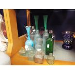 A selection of glass bottles to include ink,