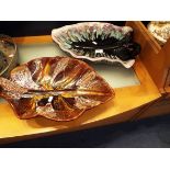 A French Vallauris brown slip glazed leaf dish together with another similar