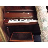 A Steinberg mahogany metal framed upright piano supplied by Harrods No.