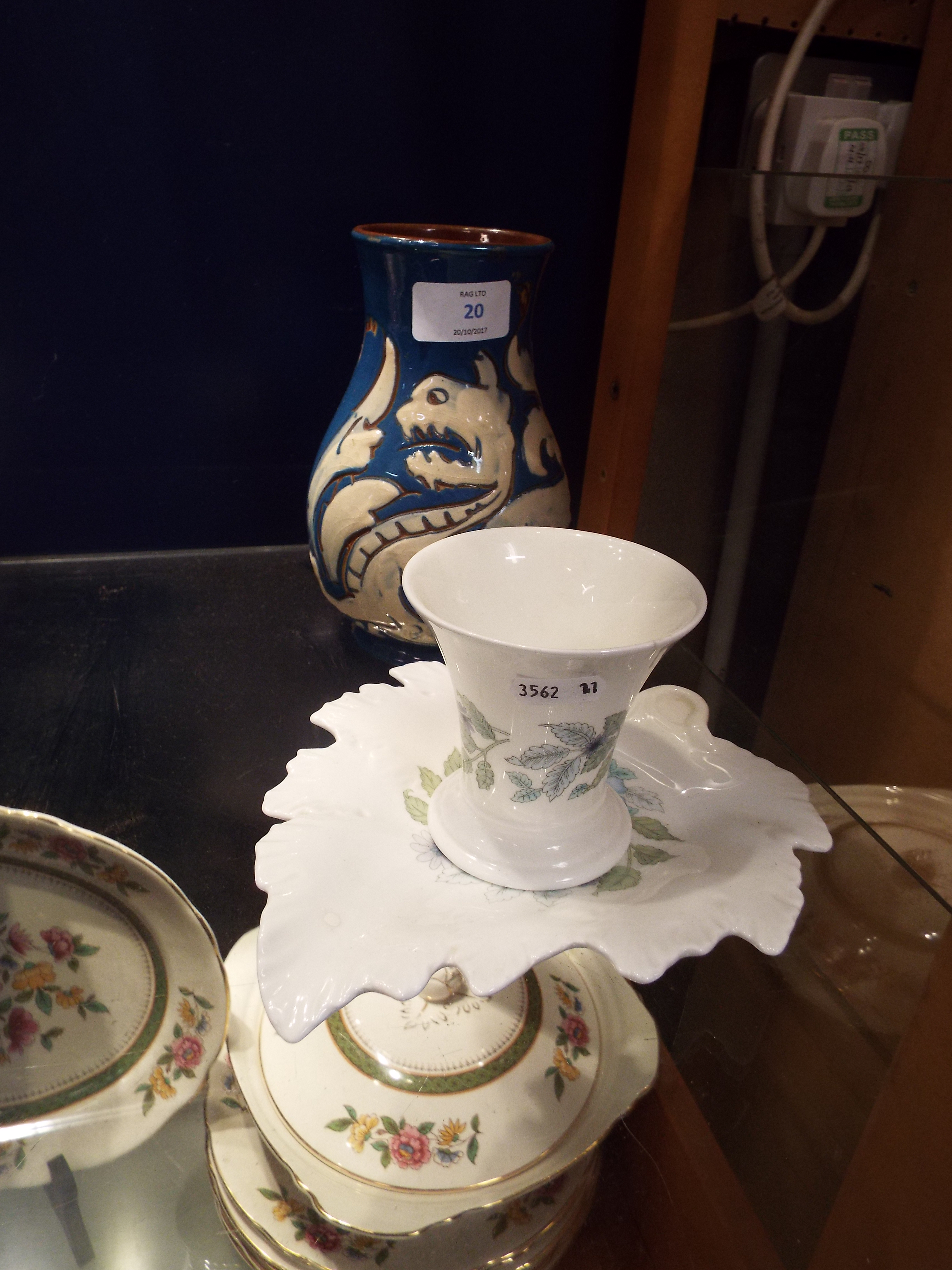 A Wedgwood leaf dish and vase in 'Clementine' pattern,