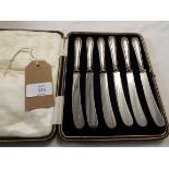 A cased set of silver handled butter knives dated Sheffield 1929