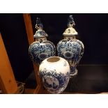 The blue and white Delft lidded vases and another