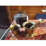 An early jelly mould with lid together with a Georgian brass pestle and mortar and another mortar