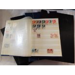 Five stamp albums containing assorted stamps mainly of Switzerland