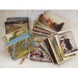 A selection of assorted postcards to include scenic,