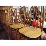 A set of four Ercol dining chairs