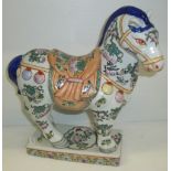 Oriental modern horse figure with colourful fruit and vine design on square base