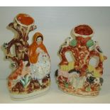 Staffordshire Red Riding Hood spill vase and one other Staffordshire spill vase